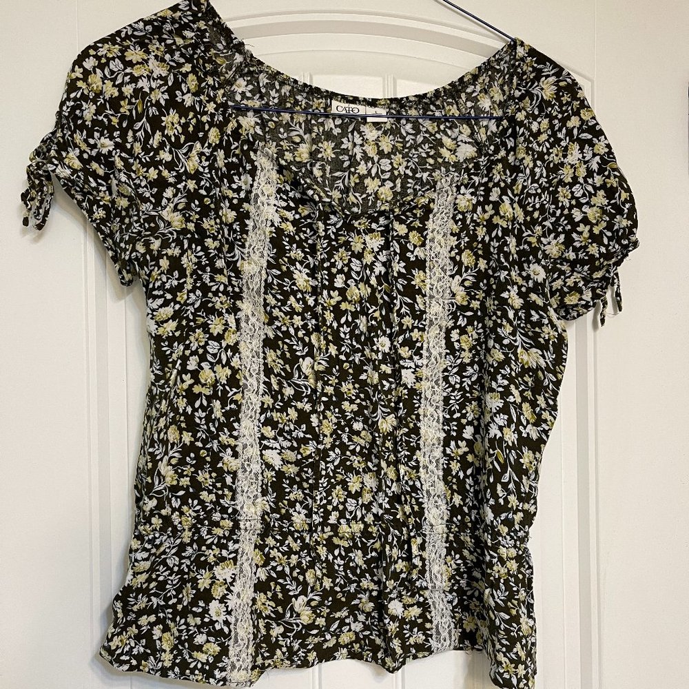 Cute short sleeve shirt with brown and yellow print with lace accent by Cato.